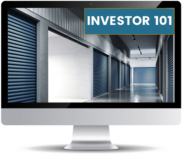 "An image of a computer monitor displaying a storage unit corridor with blue roll-up doors and the text 'INVESTOR 101' in the upper right corner."